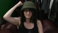 Kathleen wears an old-fashioned Norweigian army helmet from the sixties sent in by Ken. The Biggest, Blackest Dump.
