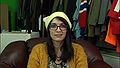Kathleen wears a Cat Shaped Life Kickstarter hat in Random Acts of Toilet.