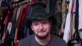 Weird stretchy black cowboy wizard hat with gold trim. Used in Bacon Taco Badges