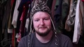 Brown and tan knit mohawk earflap hat. Used in Condoms, Roaches and Fire